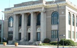 Aberdeen City Hall, a two story building with large windows and steps leading up to an entrance framed by four columns