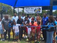 Mayor Scott and Parks and Recreation Director, Michelle Stewart and others cut the ceremonial ribbon 