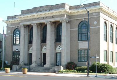 Aberdeen City Hall, a two story building with large windows and steps leading up to an entrance framed by four columns