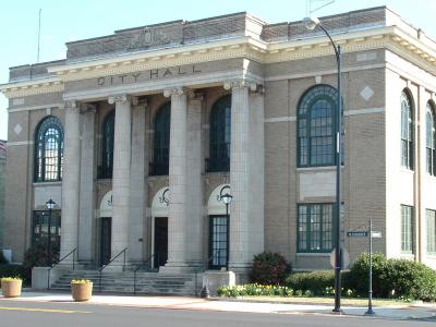 Aberdeen City Hall, a two story building with large windows and steps leading up to an entrance framed by four columns